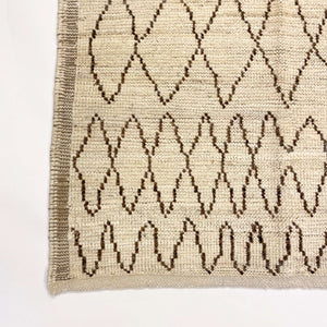 View of the edge of Anfa Vintage Moroccan Rug - H + E Goods Company