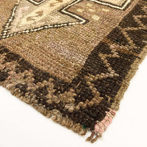 Close-up view of the edge of Aycon Vintage Oushak Rug - H+E Goods Company
