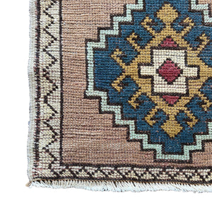 Edge of Deixa Vintage Wool Rug on white background - H+E Goods Company