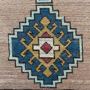 Close-up view of one of the main motifs on Deixa Vintage Wool Rug - H+E Goods Company