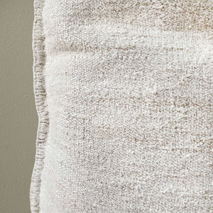 Close-up view of Emer Vintage Pillow Sack with beige background - H+E Goods Company