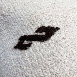 Close-up view of the embroidery on Honsu Embroidery Hemp Pillow - H+E Goods Company