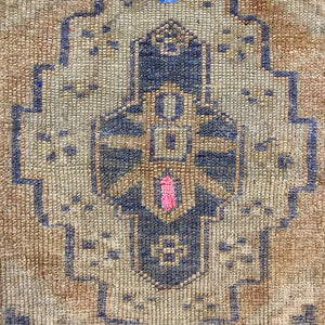 Close-up view of the main motif on Karun Vintage Oushak Rug - H+E Goods Company