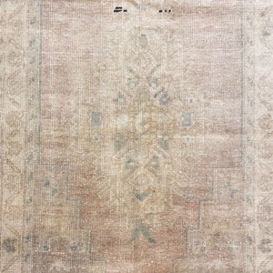 Close-up view of the main large motif on Phonic Hand-Knotted Wool Runner - H+E Goods Company