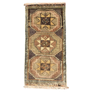 Front view of Piena Vintage Wool Rug on white background - H+E Goods Company