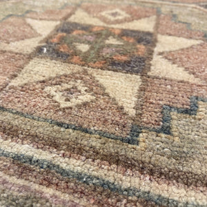 Close-up view of Piena Vintage Wool Rug - H+E Goods Company