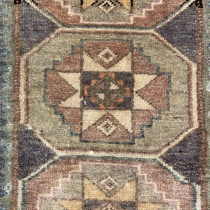 View of the main motifs on Piena Vintage Wool Rug - H+E Goods Company