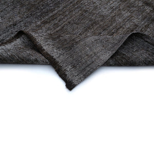 Folded edge of Tavas Vintage Kilim Rug on a white background - H+E Goods Company