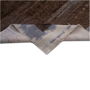 Folded edge of Urla Vintage Tulu Rug on white background - H+E Goods Company