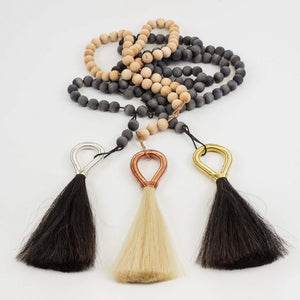 Wire Beads - Copper laid out on white surface with two other color variants next to each other - H+E Goods Company